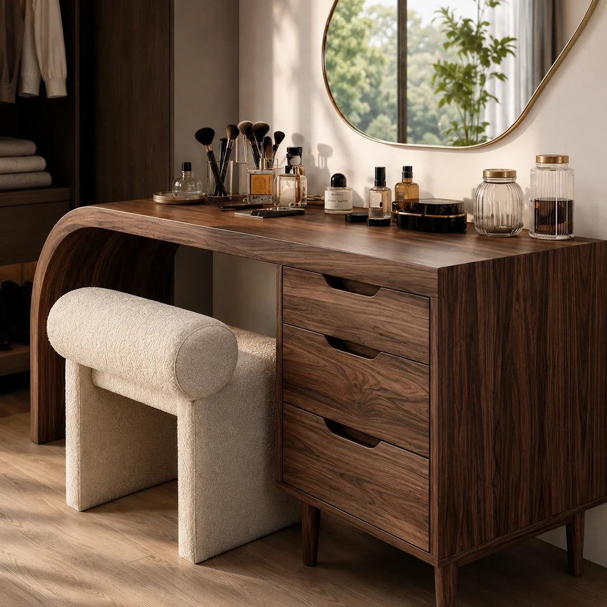 Cosmetic vanity table with dark wood tone finish and sculpted side detail in a closet