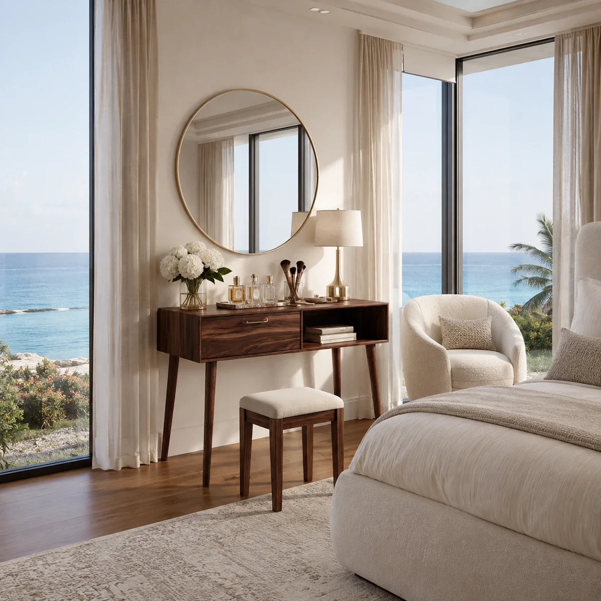 Luxury dressing table with warm wood tone and open storage beside a soft vanity stool