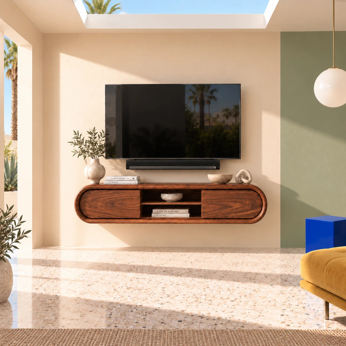 Floating media console in natural solid wood with soft curves and center shelving