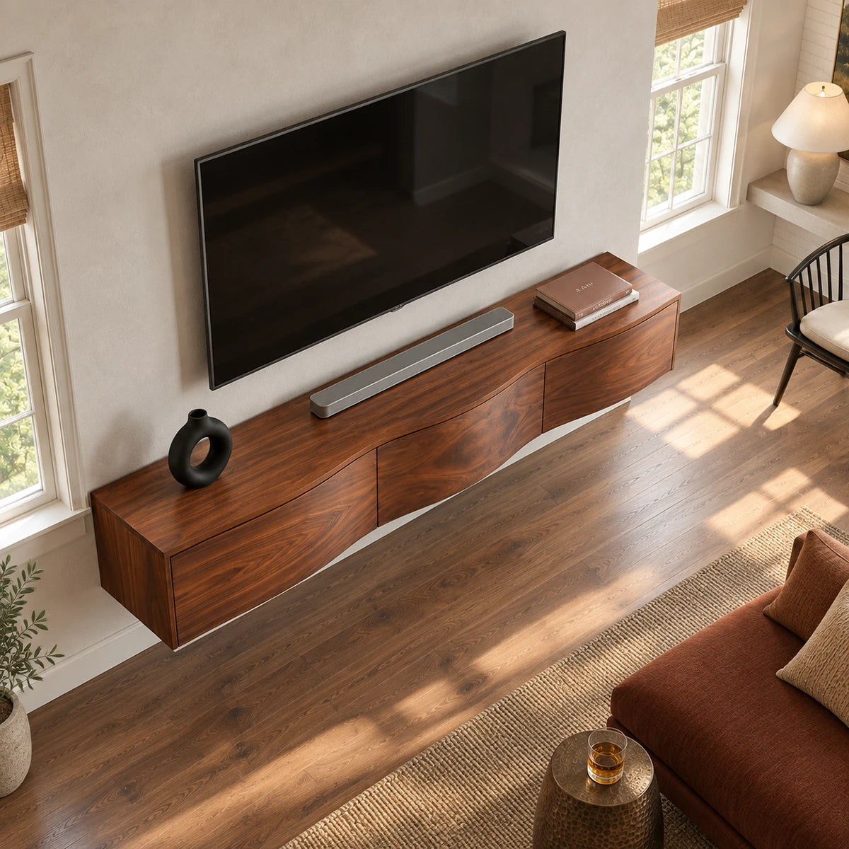 Low profile television stand in natural solid wood with floating base and sleek design