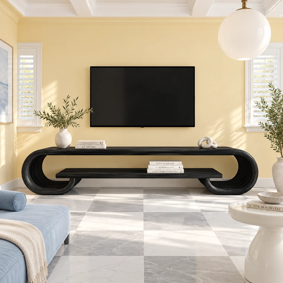 Rounded edge TV stand in solid wood with a wide top and practical shelf below storage