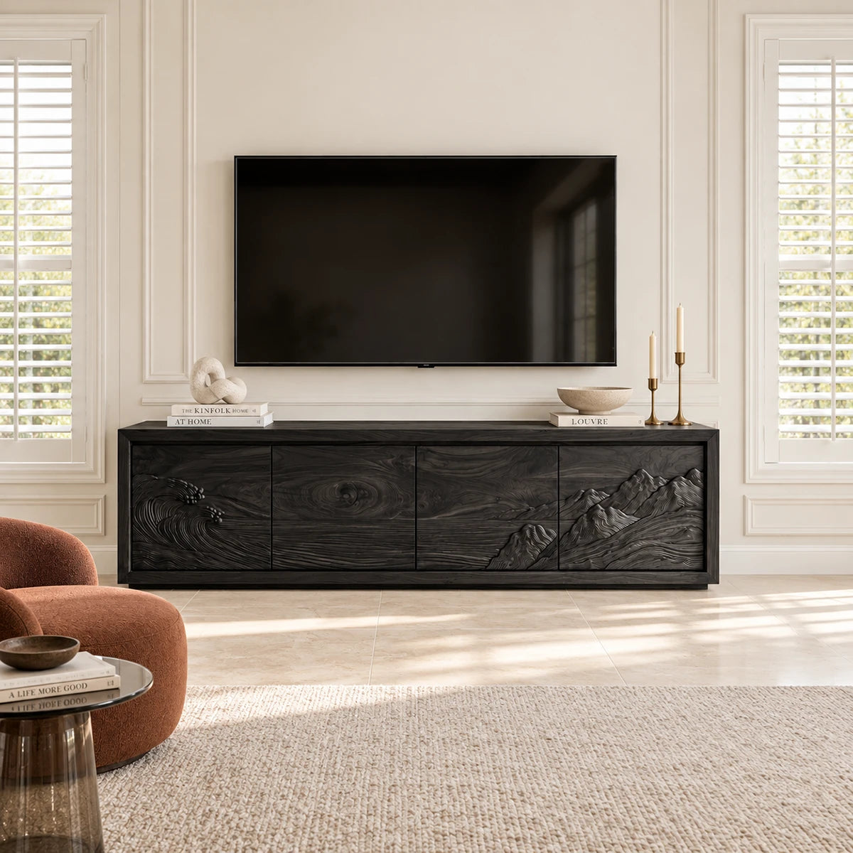 Living room TV console in solid wood with decorative carved panels and low silhouette