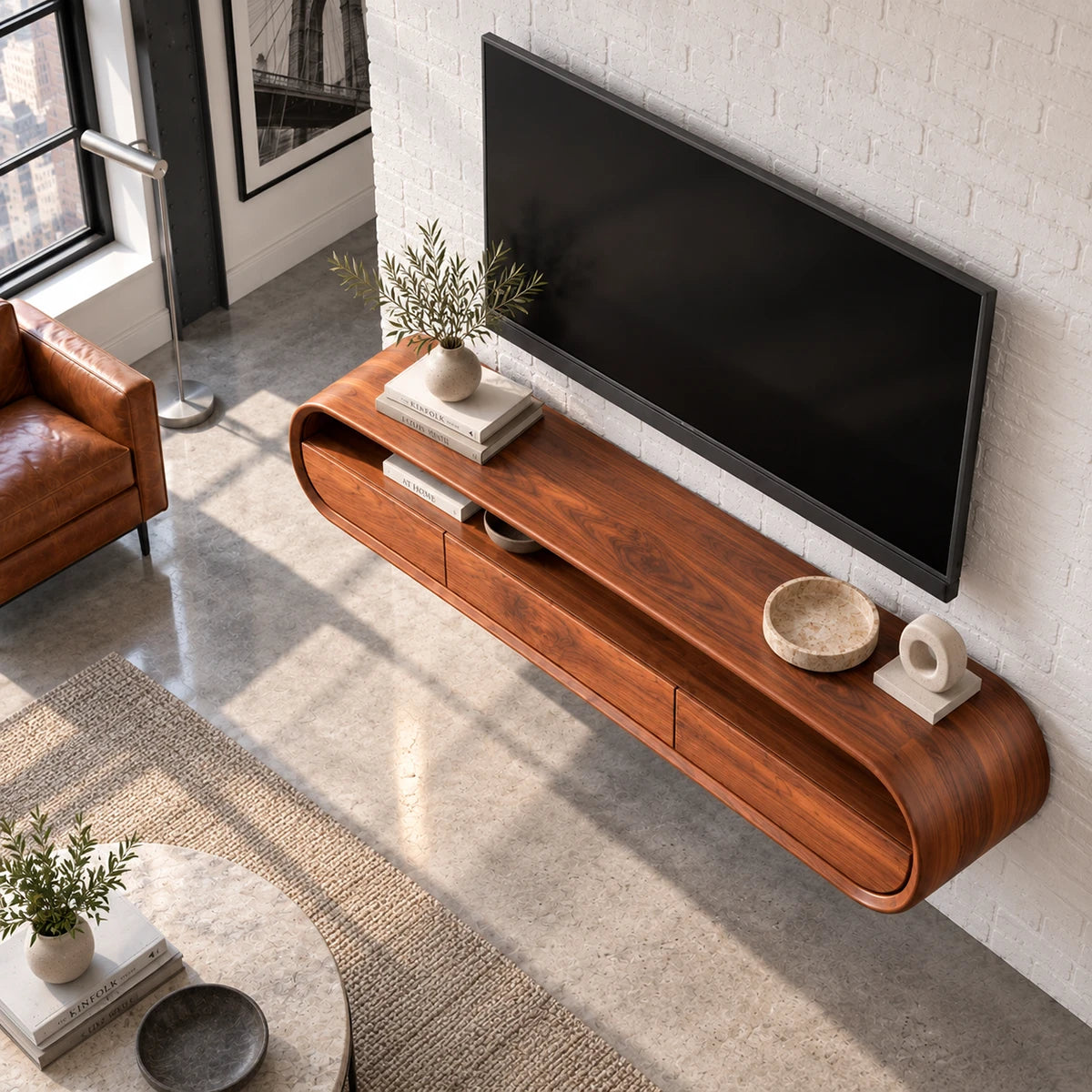 Rounded TV console in natural solid wood with streamlined silhouette and storage