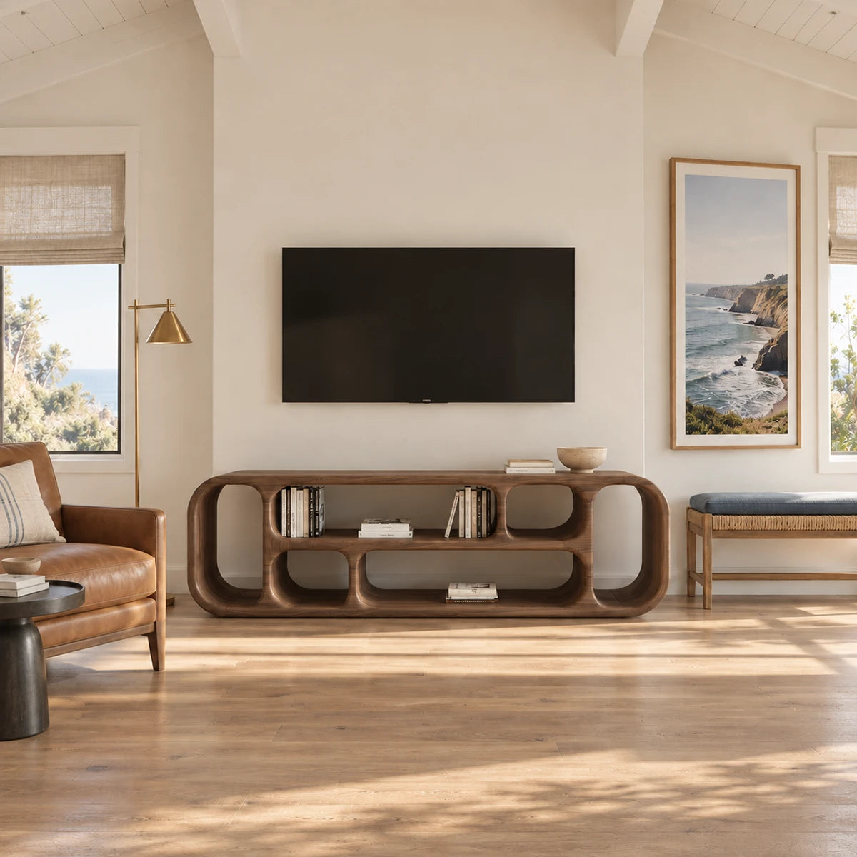 Organic media cabinet in natural solid wood with soft rounded openings below design
