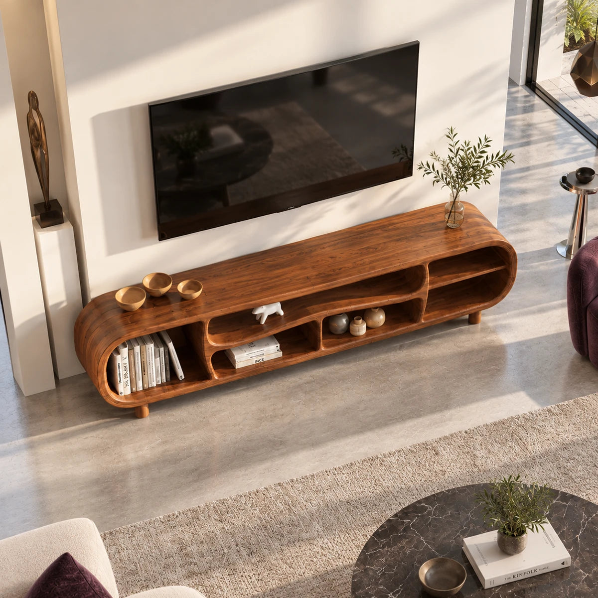 Contemporary TV console in natural solid wood with smooth curves and display shelving