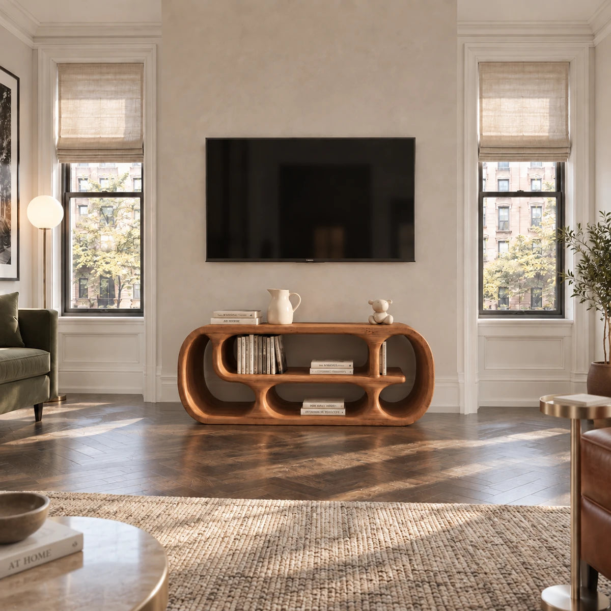 Clean lined media stand in natural solid wood with curved silhouette and open cubbies