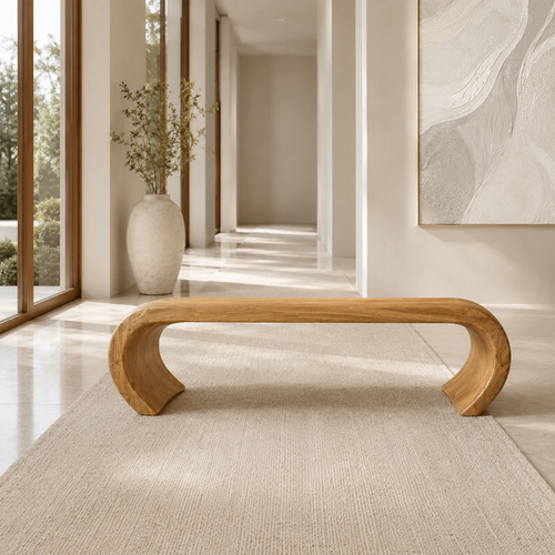 Sculptural bench with open arch base and smooth solid wood form for serene interiors