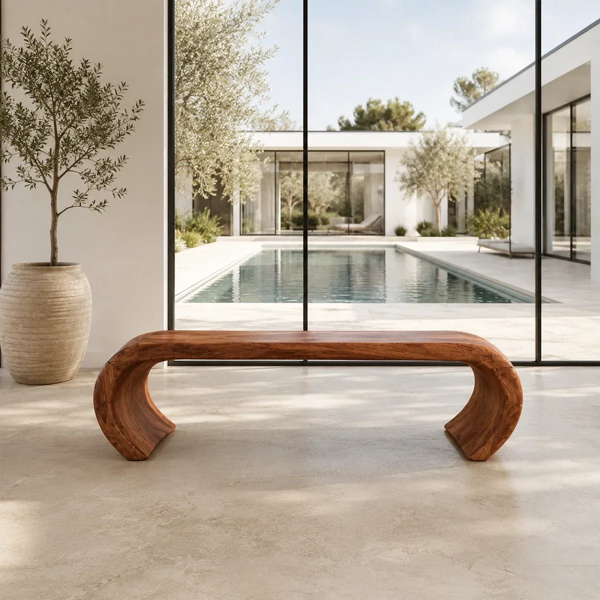 Organic bench with softened corners and continuous wood frame for relaxed modern spaces