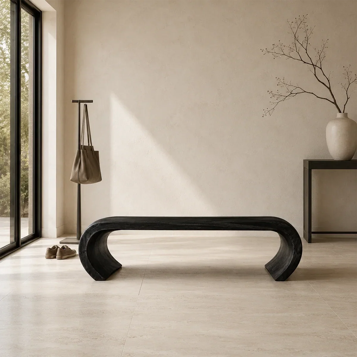 Statement bench with bold open silhouette and sculptural solid wood form for luxury homes