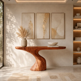 Contemporary console table showcases an asymmetrical support in a sunlit room setting