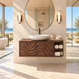 Statement vanity unit in natural solid wood with carved wave panels and open side storage