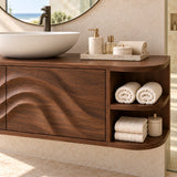 Architectural bath vanity in natural solid wood with broad carved fronts and side cubbies