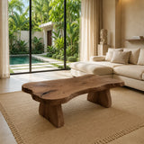 Artisan coffee table with a sculpted top and chunky supports for warm modern interiors