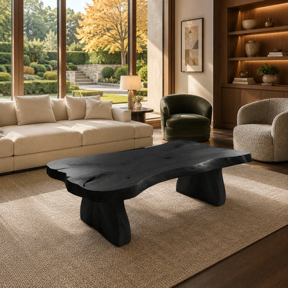 Coastal coffee table with a thick natural edge top and sturdy legs in a bright beach house