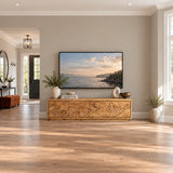 Functional TV entertainment stand in solid wood with carved panel doors and storage

