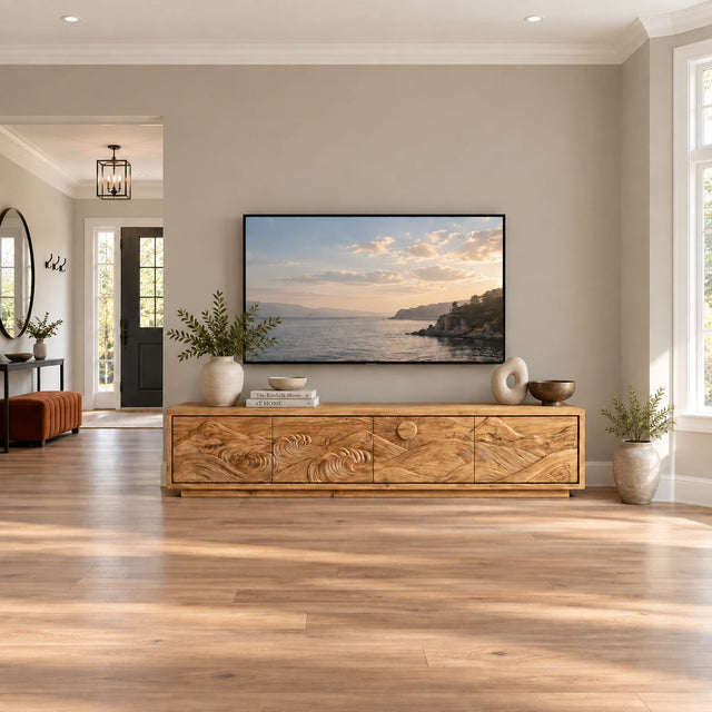 Modern solid wood TV stand with carved coastal scene and low-profile storage design
