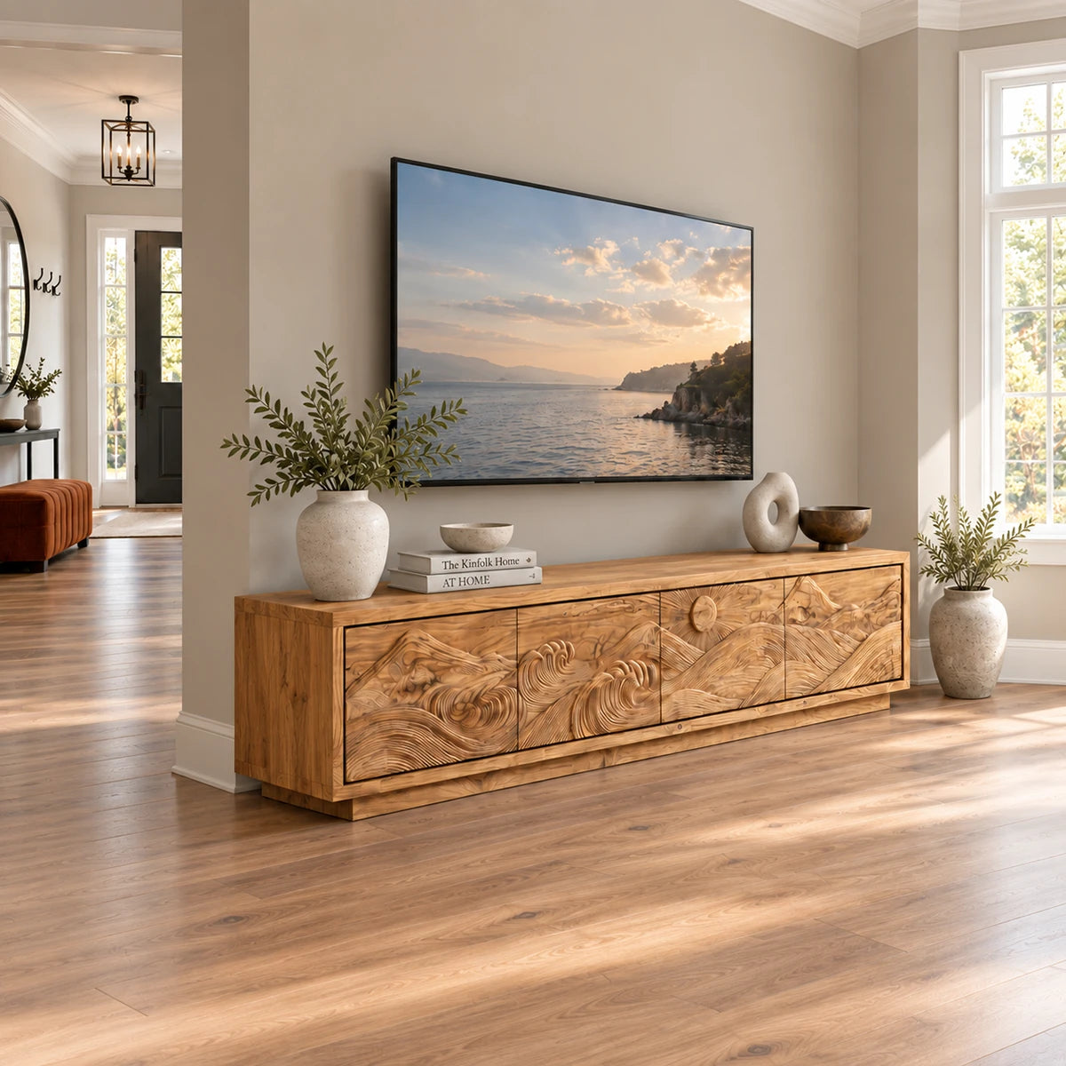 Sculptural entertainment center in solid wood with carved waves and hidden storage
