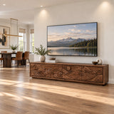 Architectural media unit in solid wood with landscape relief and low modern profile
