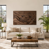 Carved landscape wall art with layered mountain relief adds depth to a modern living room