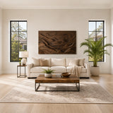 Abstract wall panel with sculpted hills and flowing forms creates a calm interior focus
