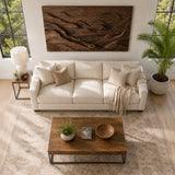 Sculptural wall panel above seating adds movement through sweeping landscape forms