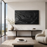 Flowing landscape relief shapes this wall decor into an artistic living room feature
