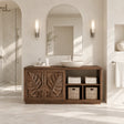Freestanding bathroom vanity in natural solid wood with leaf doors and open side storage