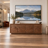 Balanced TV credenza in solid wood with scenic artwork doors and broad top surface
