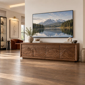 Modern solid wood TV stand with carved mountain scene and wide concealed storage
