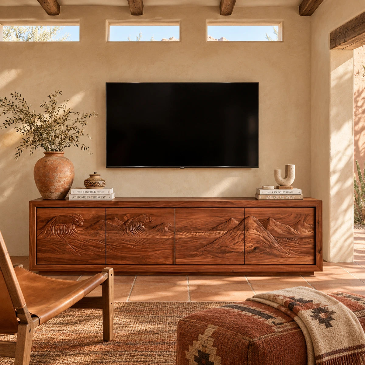 Designer entertainment unit in solid wood with scenic carved doors and sleek framing
