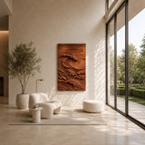 Carved wave wall art with layered ocean relief adds movement to a refined living room