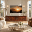 Modern TV console with wave relief fronts creates a bold focal point in a refined interior