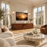 Natural solid wood TV stand with carved wave doors brings artistry to a luxury living room