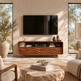 Refined TV stand with carved relief panels and open compartments for a clean media setup