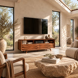 Modern media console with sculpted front panels and open shelves for a refined interior
