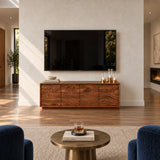 Statement media console in solid wood with carved wave imagery and clean geometry
