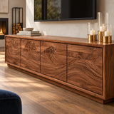 Low-profile TV console in solid wood with ocean-inspired carving and sleek storage
