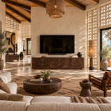 Sculpted media console in natural solid wood with four doors and bold wave fronts