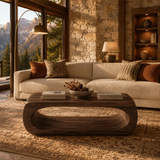 Low profile coffee table with open loop base and broad solid wood top for stylish rooms