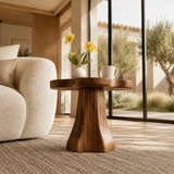 Designer side table with soft organic edges and visible grain for modern room styling