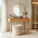 Contemporary makeup vanity showcases slim supports and useful drawer storage indoors