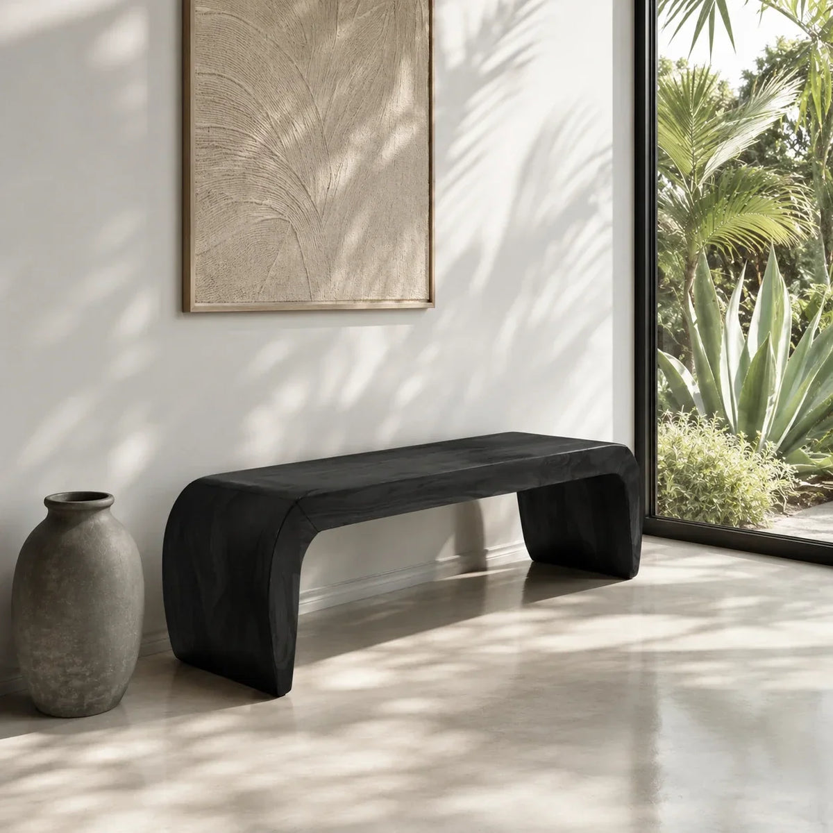 Handcrafted bench with flowing ends and solid wood structure for calm modern interiors