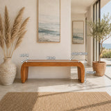 Statement bench with architectural curves and solid wood form for upscale entry spaces
