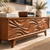 Sculpted TV console with flowing relief fronts and roomy storage for media setups