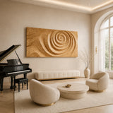 A large abstract wall sculpture brings sweeping spiral texture to a spacious living area