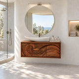 Clean lined vanity unit in natural solid wood with sculpted doors and floating profile
