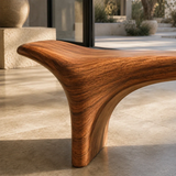 Designer bench with a fluid seat line and bold solid wood base for sophisticated interiors