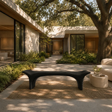 Contemporary bench with flowing silhouette and solid wood construction for refined hallways