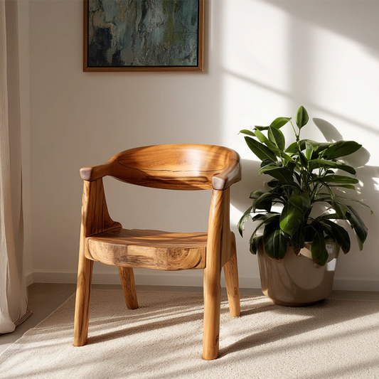 A modern wooden armchair with curved backrest and sculpted seat enhances cozy interior spaces