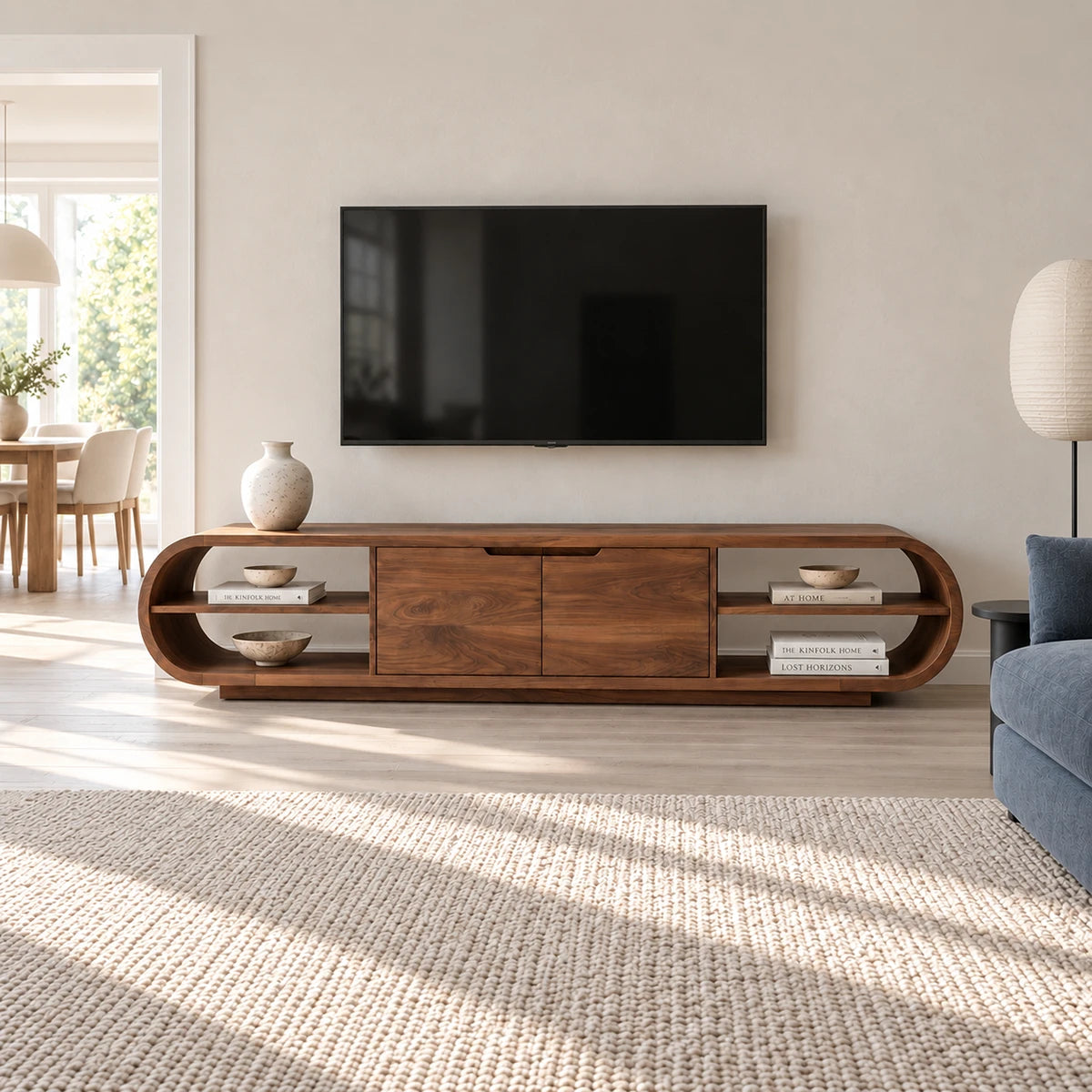 Modern entertainment stand in solid wood with rounded shelves and center storage